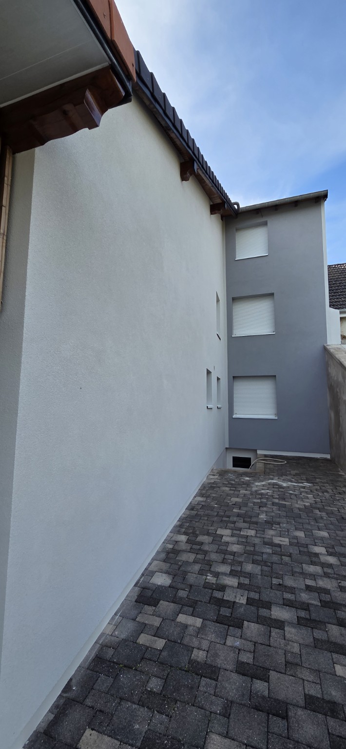 Façade après isolation thermique par l’extérieur ITE et finition extérieure